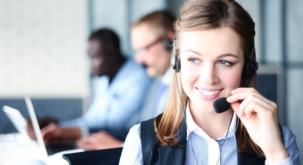 office technology solutions A technology call centre employe helps out with a technical issue